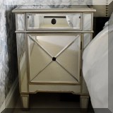 F31. Mirrored nightstand with cabinet. 28”h x 20”w x 14”d 